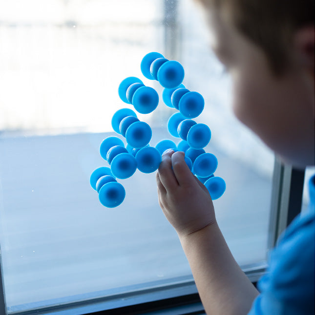 Fat Brain Toys Squigz Deluxe Set Large Pot it Travel Fidget Toys Sensory Toys Best Seller Retired Gifting Idea for 3yrs+