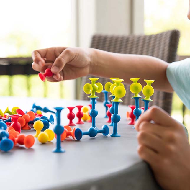 Fat Brain Toys Mini Squigz Pot it Travel Fidget Toys Sensory Toys Gifting Idea for 5yrs+